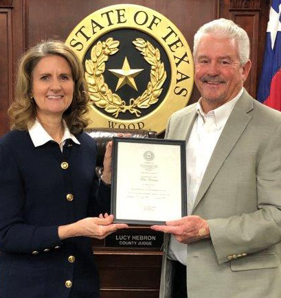 County Judge Lucy Hebron appointed Tom Keenan of Lake Fork as new board member and chairman of the Wood County Economic Development Commission.
